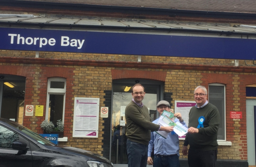 James Duddridge MP giving out Commuter Surveys with Cllr James Moyies and local candidate Daniel Nelson