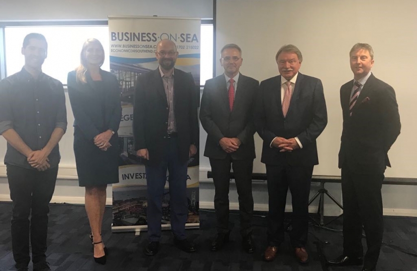 James with panel at Business Partnership Event