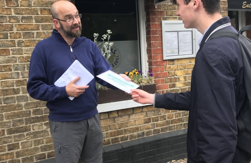 James Duddridge handing out commuter surveys