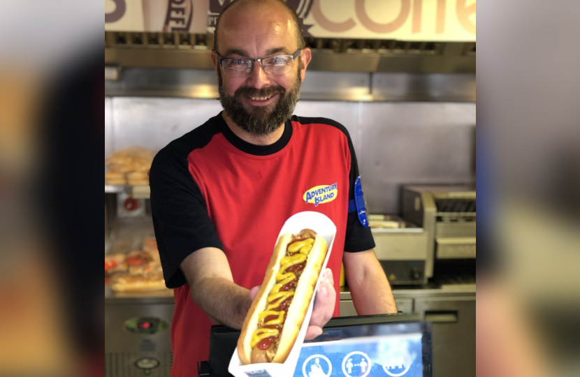 James Duddridge MP serves hot dogs at Adventure Island