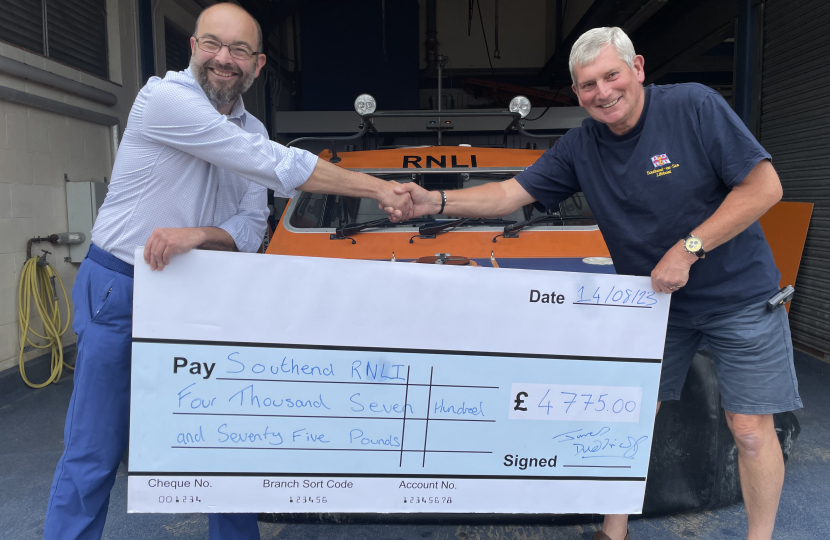 Sir James presenting Tony Clarke the cheque