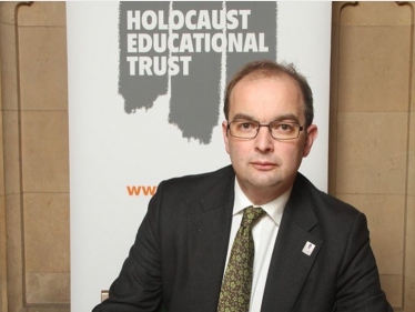 James Duddridge MP signing the Holocaust Educational Trust Book of Commitment